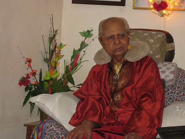 155_Bhauji in his red robe.jpg